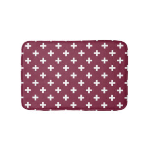 White polka crosses on mulberry bath mat