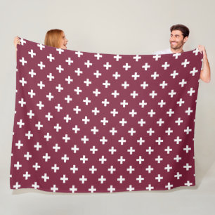 White polka crosses on mulberry fleece blanket