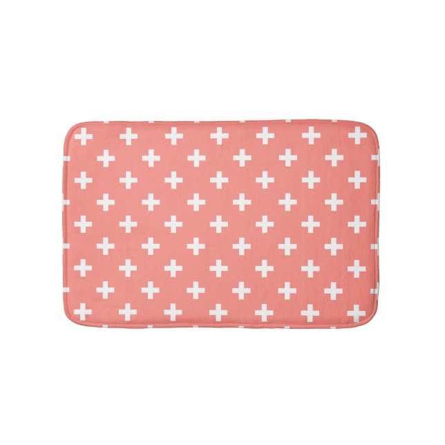 White polka crosses on peach bath mat (Front)