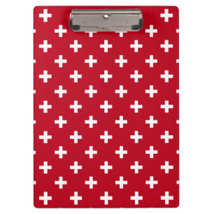 White polka crosses on red clipboard