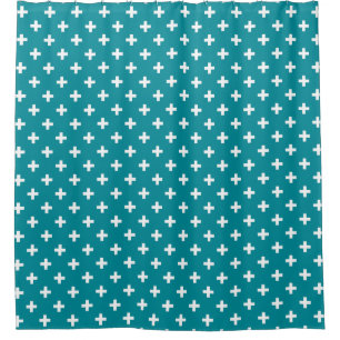 White polka crosses on teal