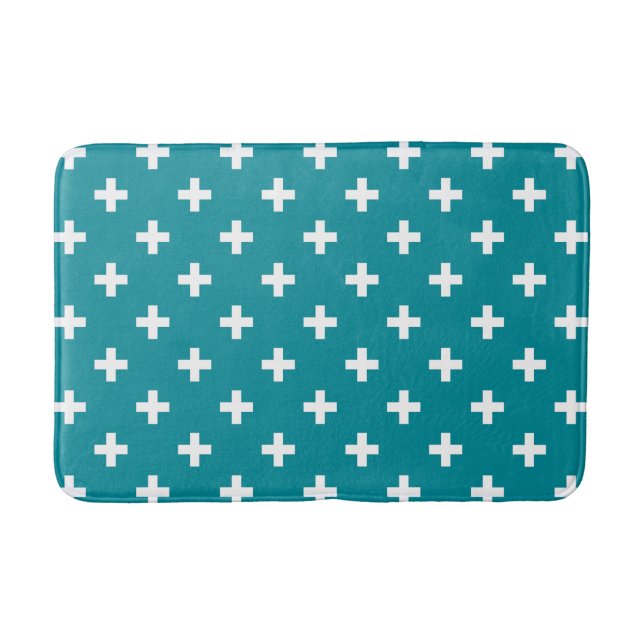 White polka crosses on teal bath mat (Front)