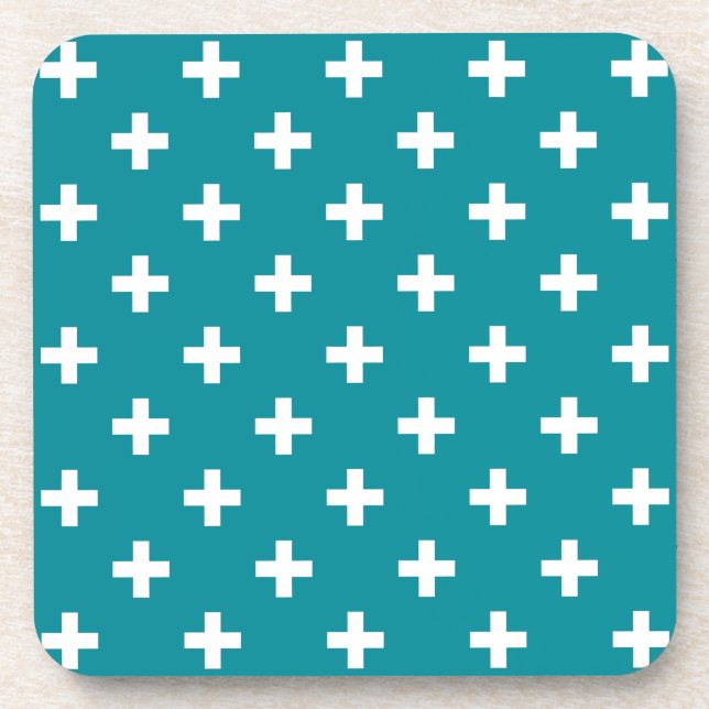 White polka crosses on teal coaster (Front)