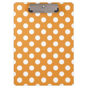 White polka dots on amber clipboard