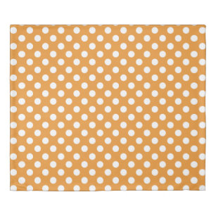 White polka dots on amber duvet cover