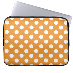White polka dots on amber laptop sleeve