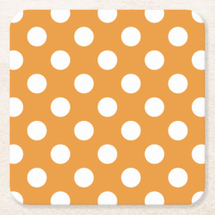 White polka dots on amber square paper coaster