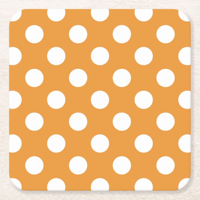 White polka dots on amber square paper coaster (Front)