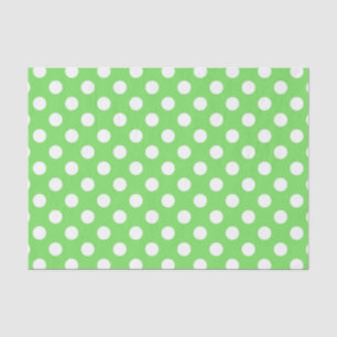 White polka dots on apple green tissue paper