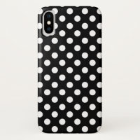 White polka dots on black