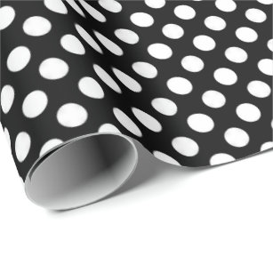 white polka dots on black wrapping paper