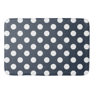 White polka dots on blue-grey bath mat