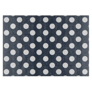 White polka dots on blue-grey cutting board