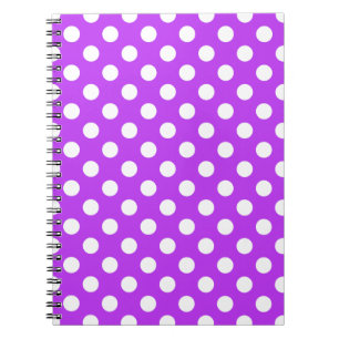 White polka dots on bright purple notebook