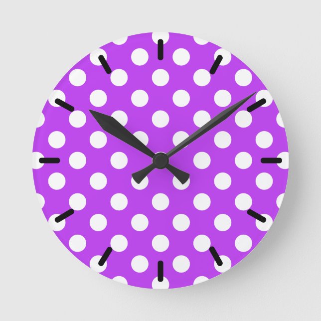 White polka dots on bright purple round clock (Front)