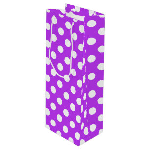 White polka dots on bright purple wine gift bag