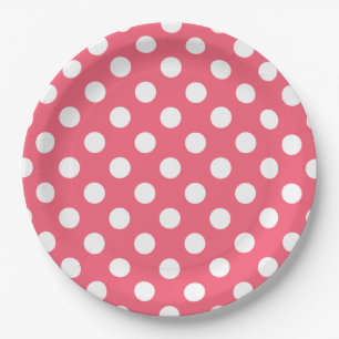 White polka dots on coral paper plate
