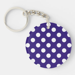 White polka dots on dark blue keychain