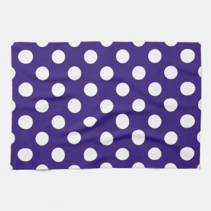 White polka dots on dark blue kitchen towel