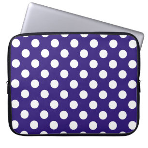 White polka dots on dark blue laptop sleeve