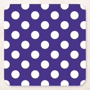 White polka dots on dark blue square paper coaster