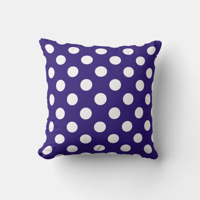 White polka dots on dark blue throw pillow (Front)