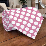White Polka Dots on Dusty Pink Custom Necktie<br><div class="desc">This custom necktie features a classic and stylish design with crisp white polka dots set against a sophisticated dusty pink background. Perfect for adding a touch of personality to any outfit, this tie is ideal for both formal and casual occasions. Its timeless pattern ensures versatility, making it a great accessory...</div>