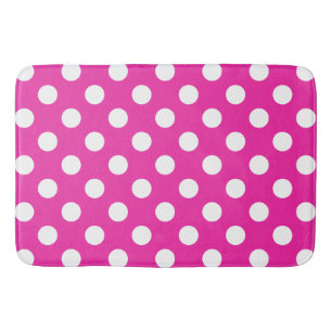 White polka dots on fuchsia bath mat