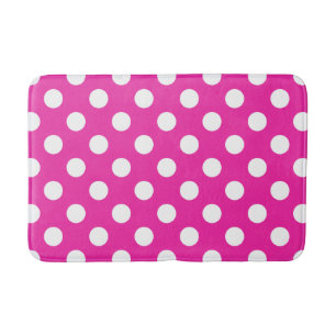 White polka dots on fuchsia bath mat