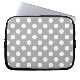 White polka dots on grey laptop sleeve