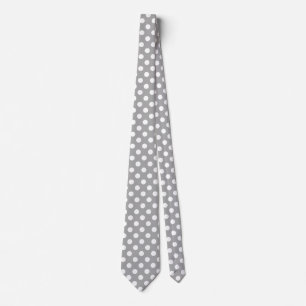 White polka dots on grey tie