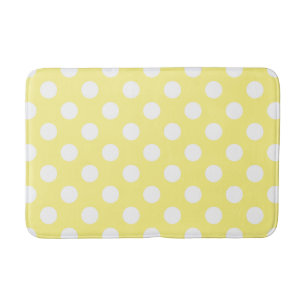 White polka dots on lemon yellow bath mat