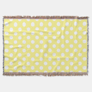 White polka dots on lemon yellow throw blanket