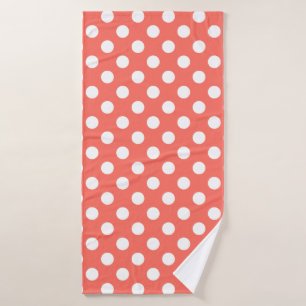 White polka dots on living coral bath towel