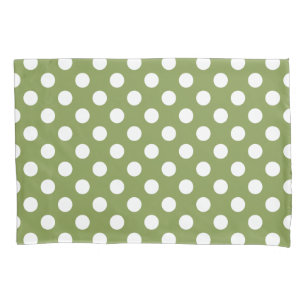 White polka dots on olive green pillowcase