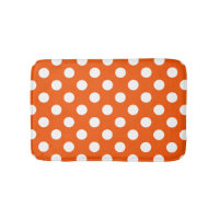White polka dots on orange