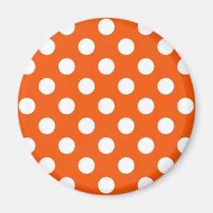 White polka dots on orange magnet