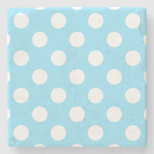 White polka dots on pale blue stone coaster