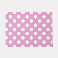 White polka dots on pale pink