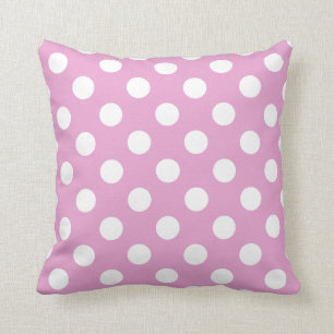 White polka dots on pale pink throw pillow