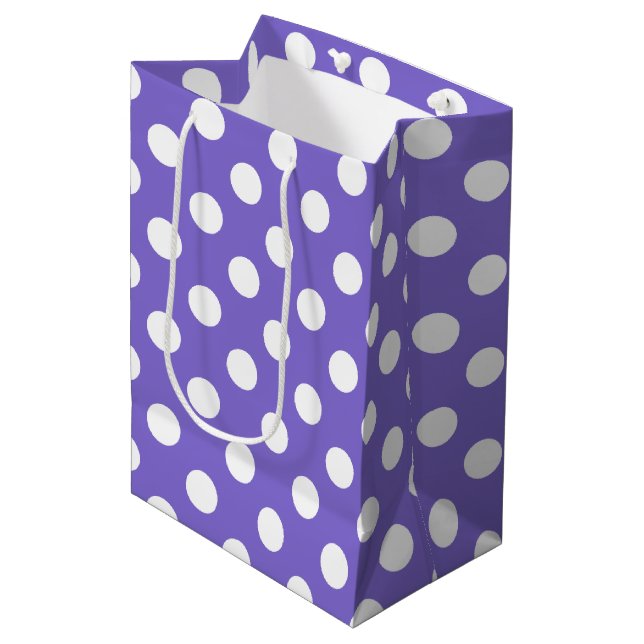 White polka dots on periwinkle medium gift bag (Front Angled)