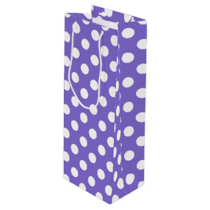White polka dots on periwinkle wine gift bag