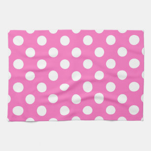 White polka dots on pink kitchen towel