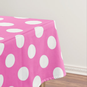 White polka dots on pink tablecloth