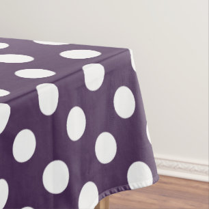 White polka dots on plum purple tablecloth