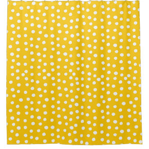 White polka dots on yellow seamless pattern