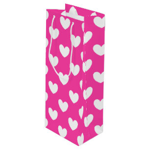 White polka hearts on fuchsia pink wine gift bag