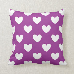 White polka hearts on purple throw pillow