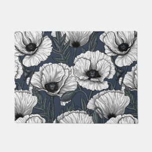 White poppies on navy doormat