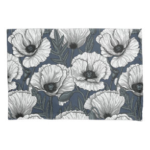 White poppies on navy pillowcase